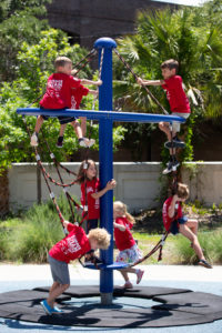 children climbing on a playground