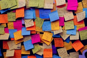 wall covered in Post-It notes with messages of hope and affirmation
