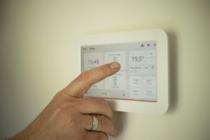 saving energy by adjusting the thermostat