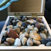 box of polished rocks