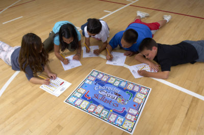 students play a game to incorporate physical activity in their routine