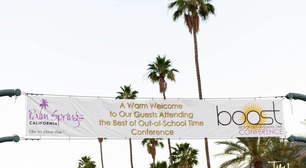 BOOST Banner hanging over Palm Canyon Drive