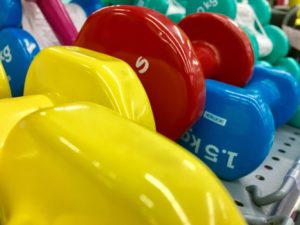 stack of colorful dumbbells