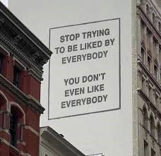Wall mural that reads: Stop trying to be liked by everybody. You don't even like everybody.