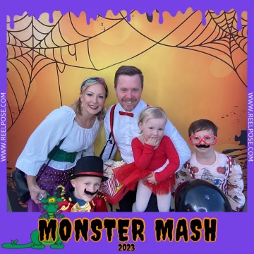 A photo of Andrea and her family (husband Drew and three children) in costumes.