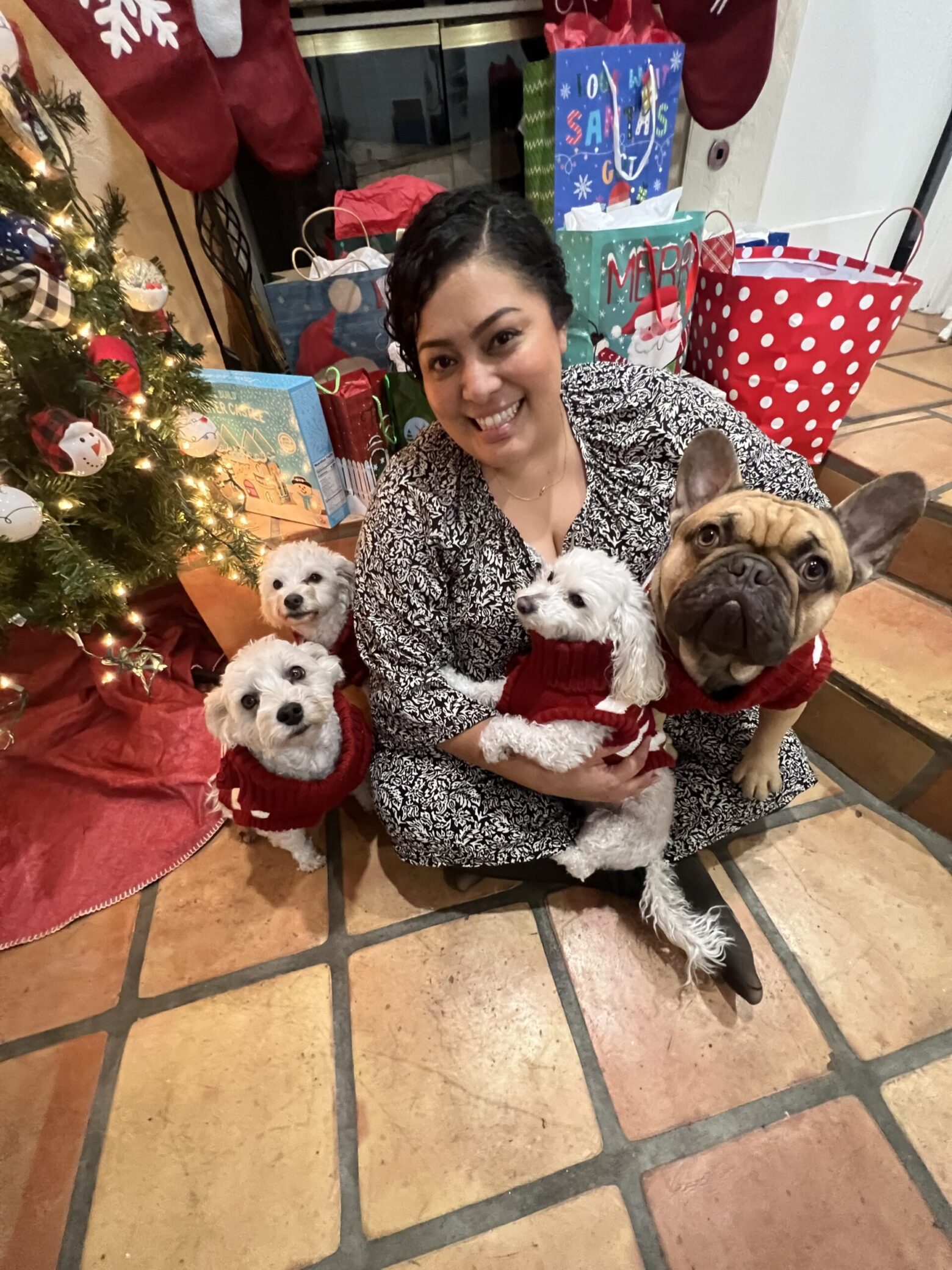 A photo of Diana with 4 dogs.