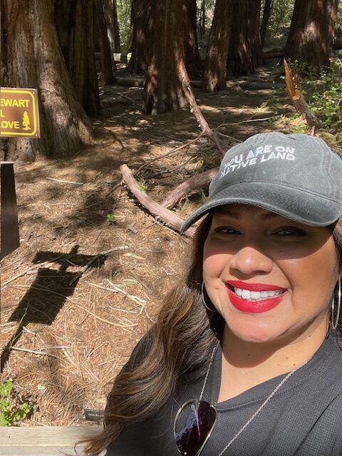 A photo of Melissa hiking outdoors.