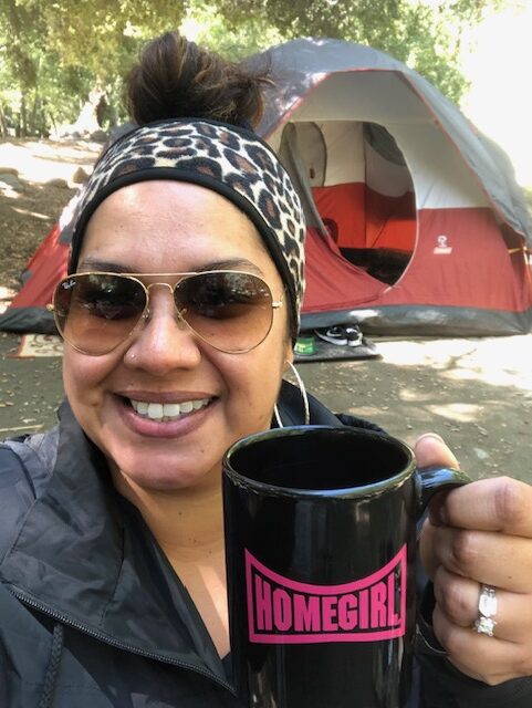 A photo of Melissa camping.