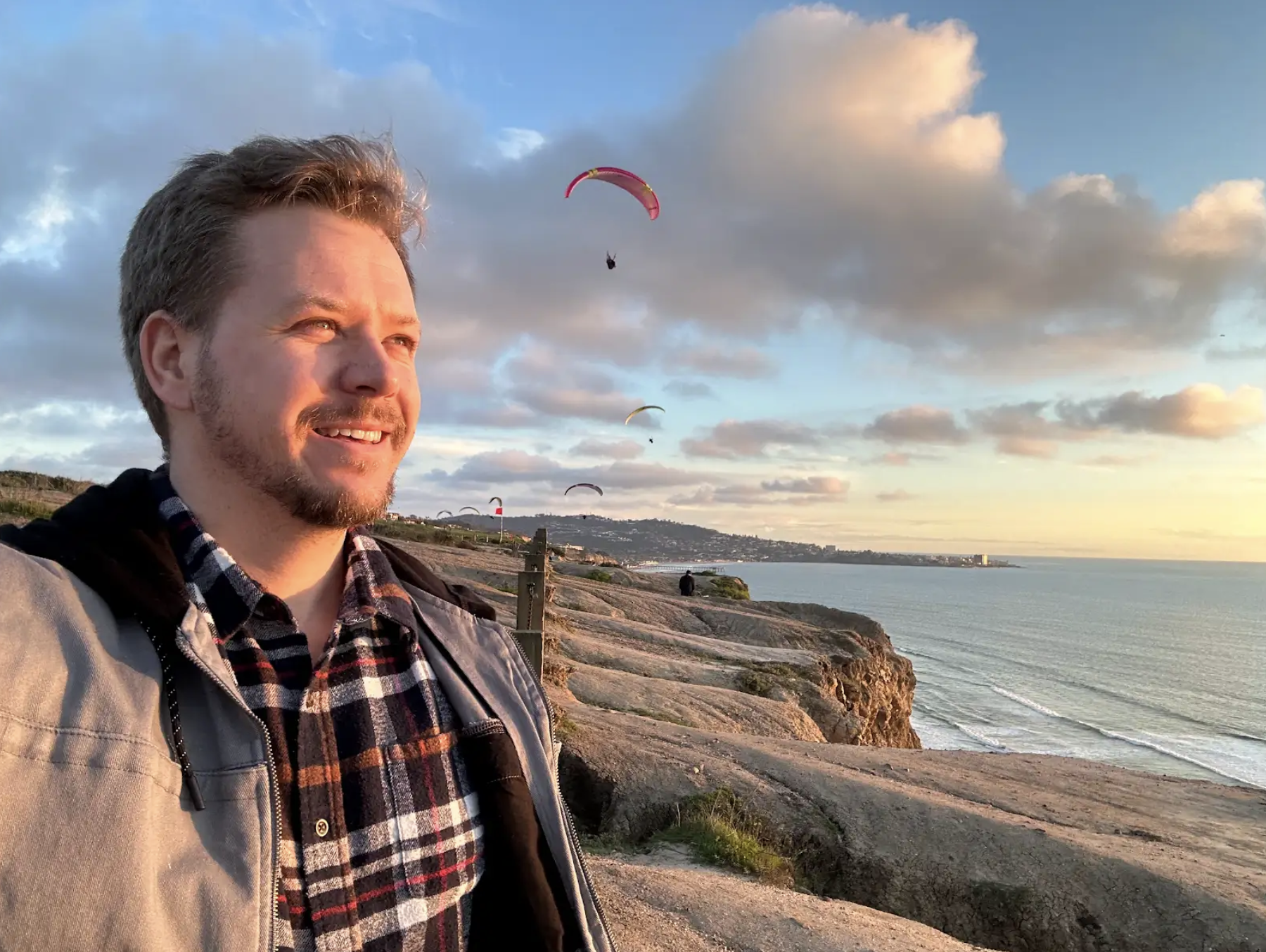 A photo of Connor by the ocean.